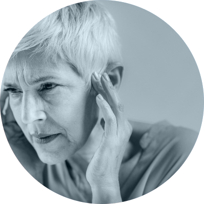 Woman with Tinnitus holding her ear
